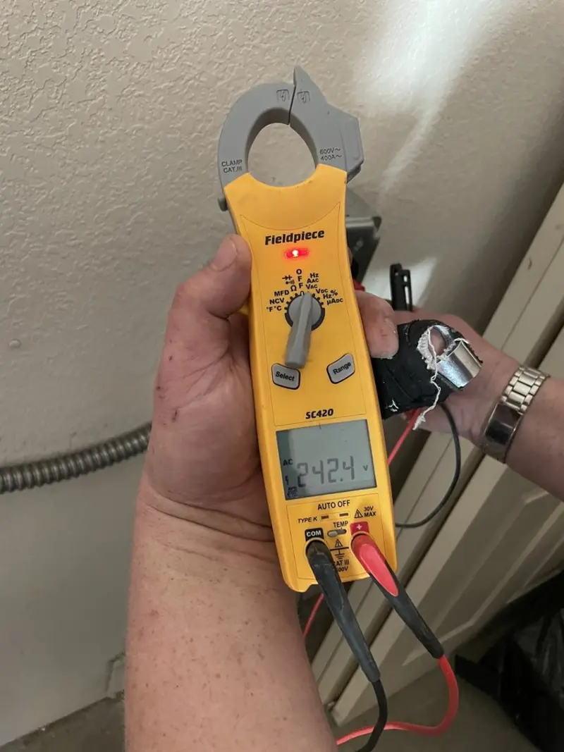 Voltage testing with clamp meter during Aluminum Wiring Replacement in Elfers